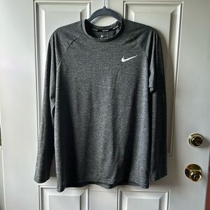 “Nike” men’s dri-fit swim shirt size medium
